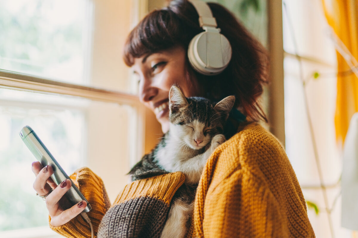Pet parent on a telehealth visit with her cat