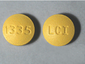 Generic RX Doxycycline for pets, yellow round tablets marked 1335 LCI for pet health care